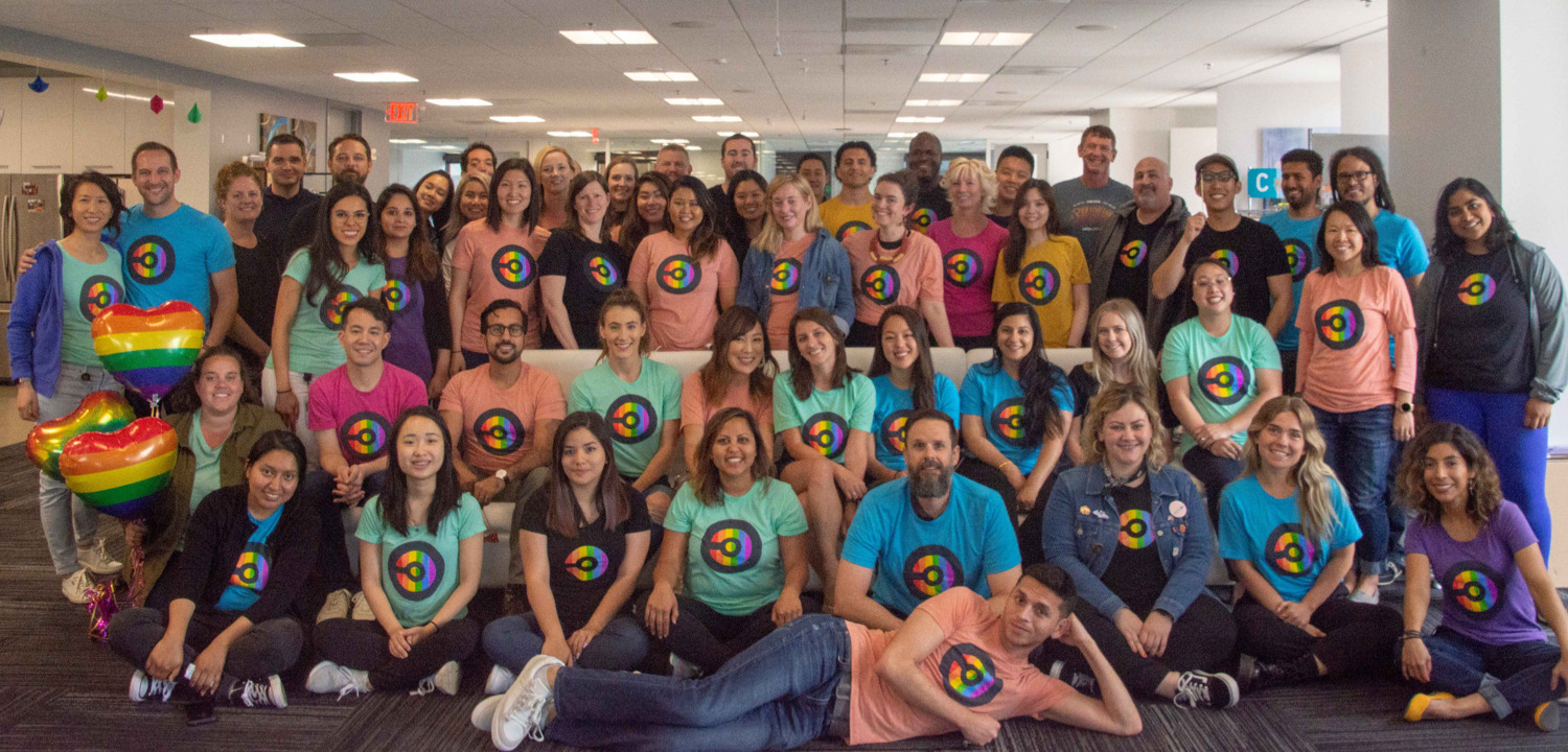 Team members dressed up in matching shirts as part of our annual Pride celebration.